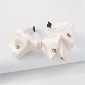 White Polystere & Pearl Sunflower Bow Hard Headband